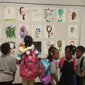 Libertas Students Admiring Their Work