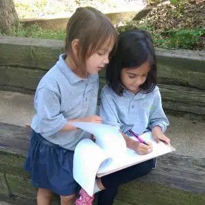 Libertas Students Writing Outside